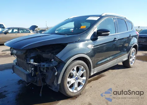 2014 Ford Escape Titanium z USA, uszkodzony, nr VIN 1FMCU9J93EUD13221
